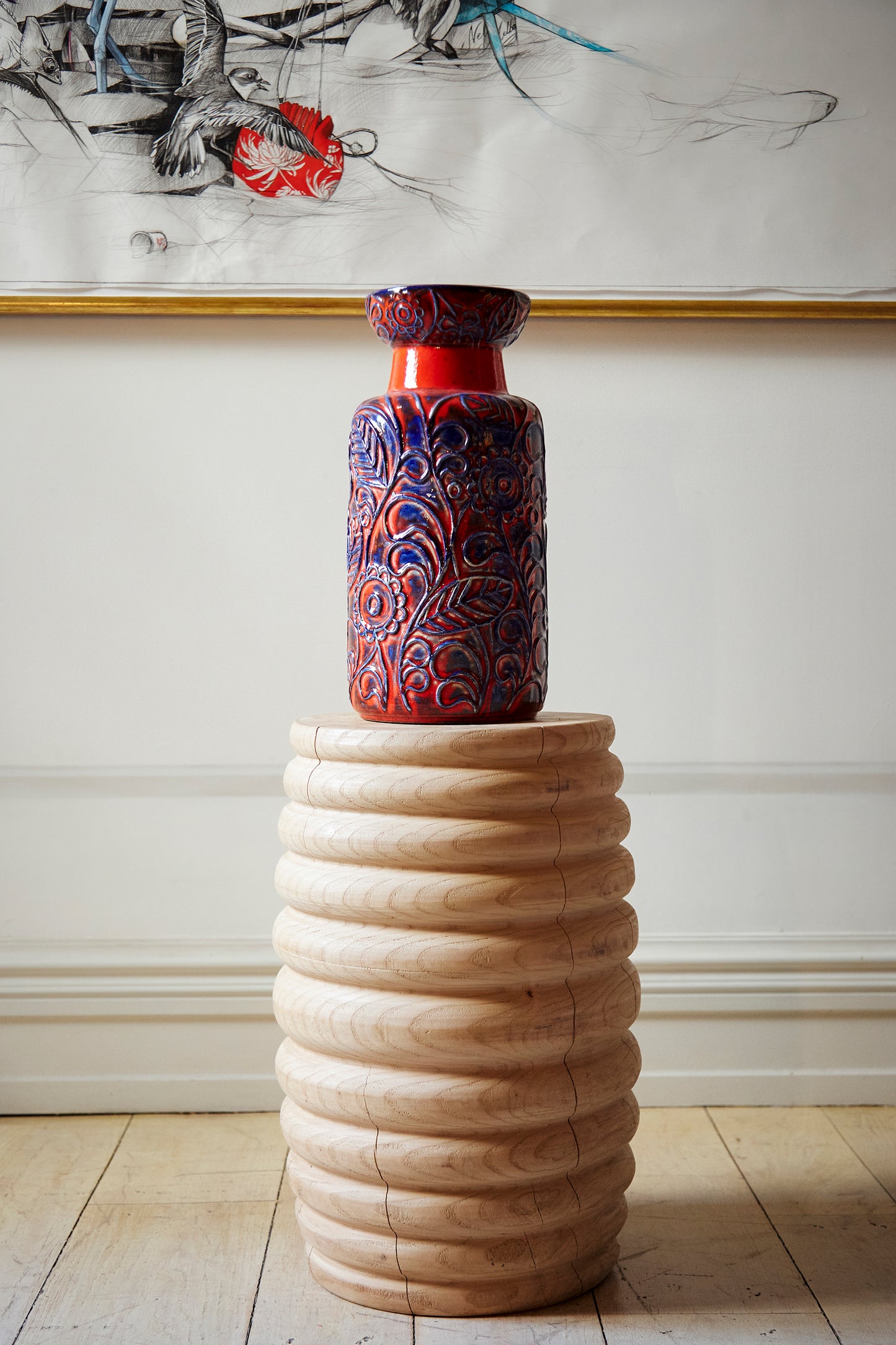 Tall blue and red vase
