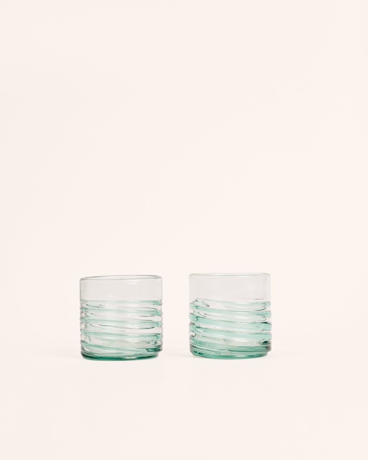 <transcy>Pair of small green circle glasses</transcy>