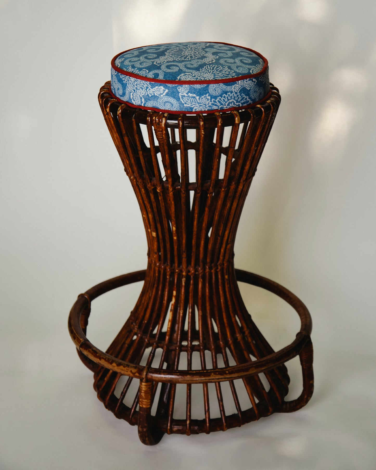 Pair of rattan stools by Tito Agnoli for Bonacina