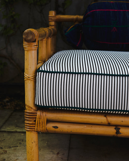 Bamboo sofa with striped mattress