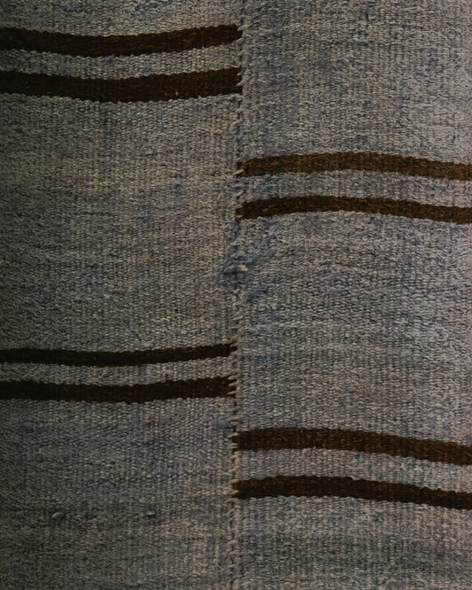 Narrow blue striped rug