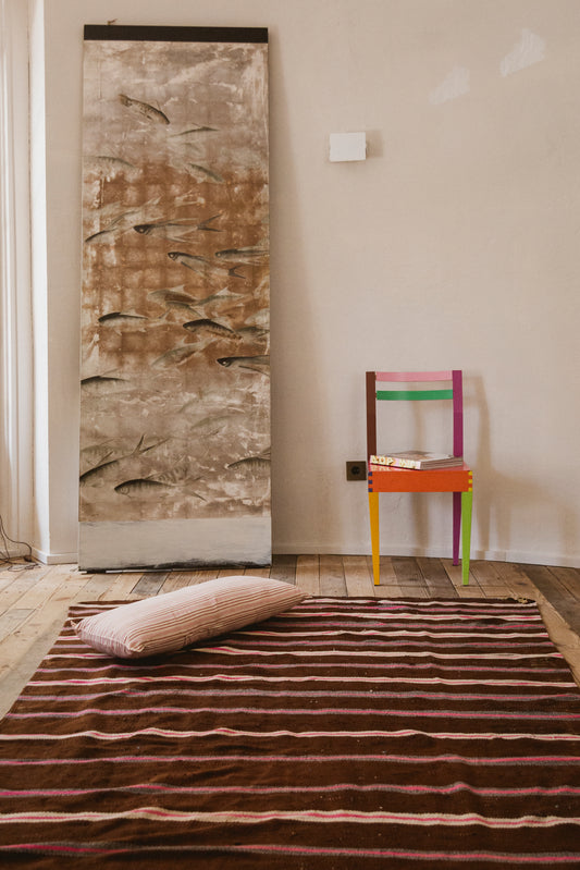 Brown and pink striped rug