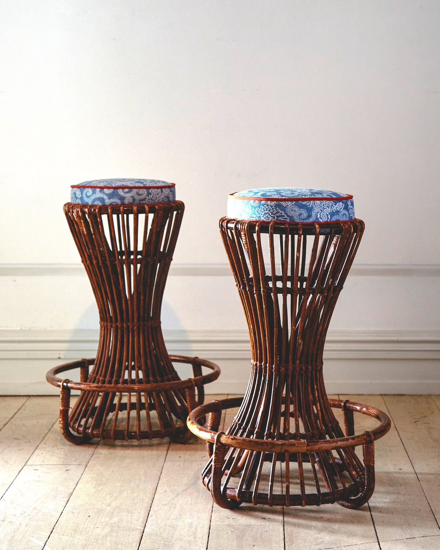 Pair of rattan stools by Tito Agnoli for Bonacina