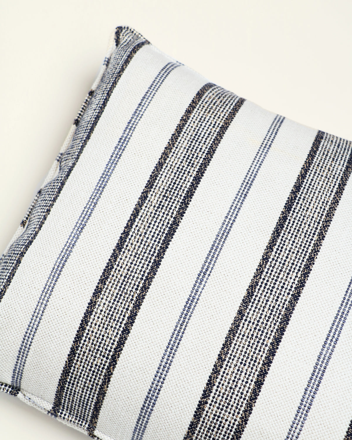 Black and white striped cushion