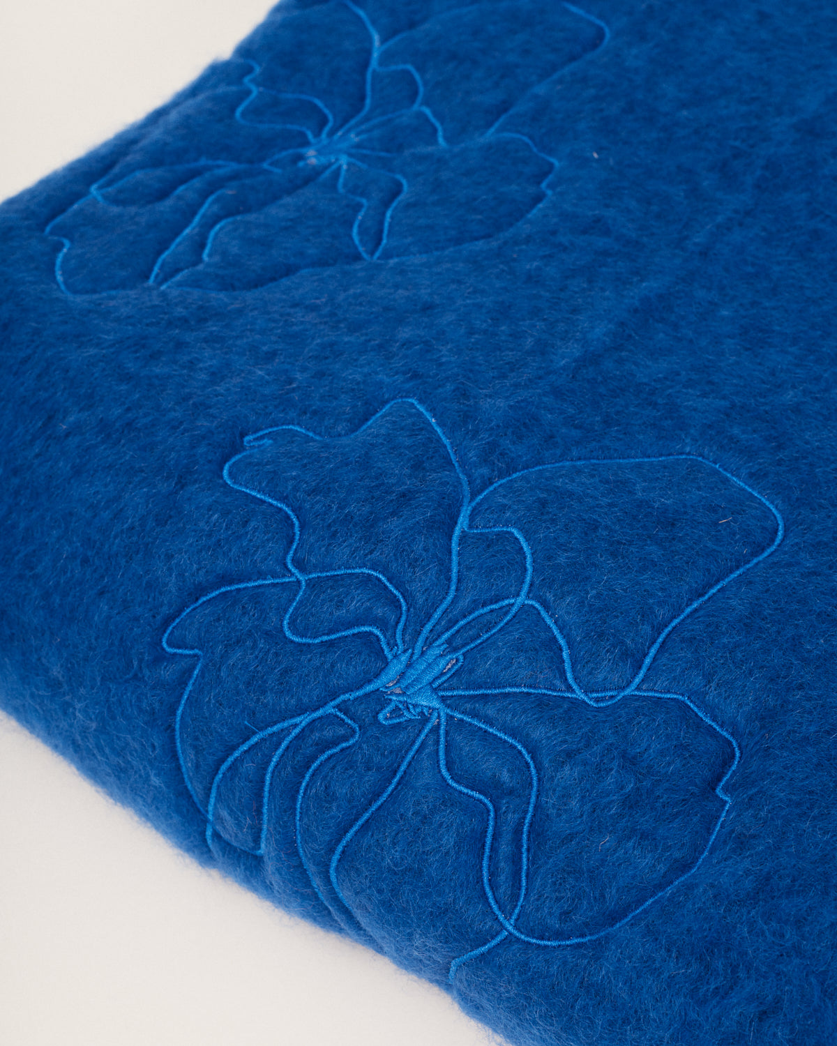 Blue mohair blanket with lilium embroidery