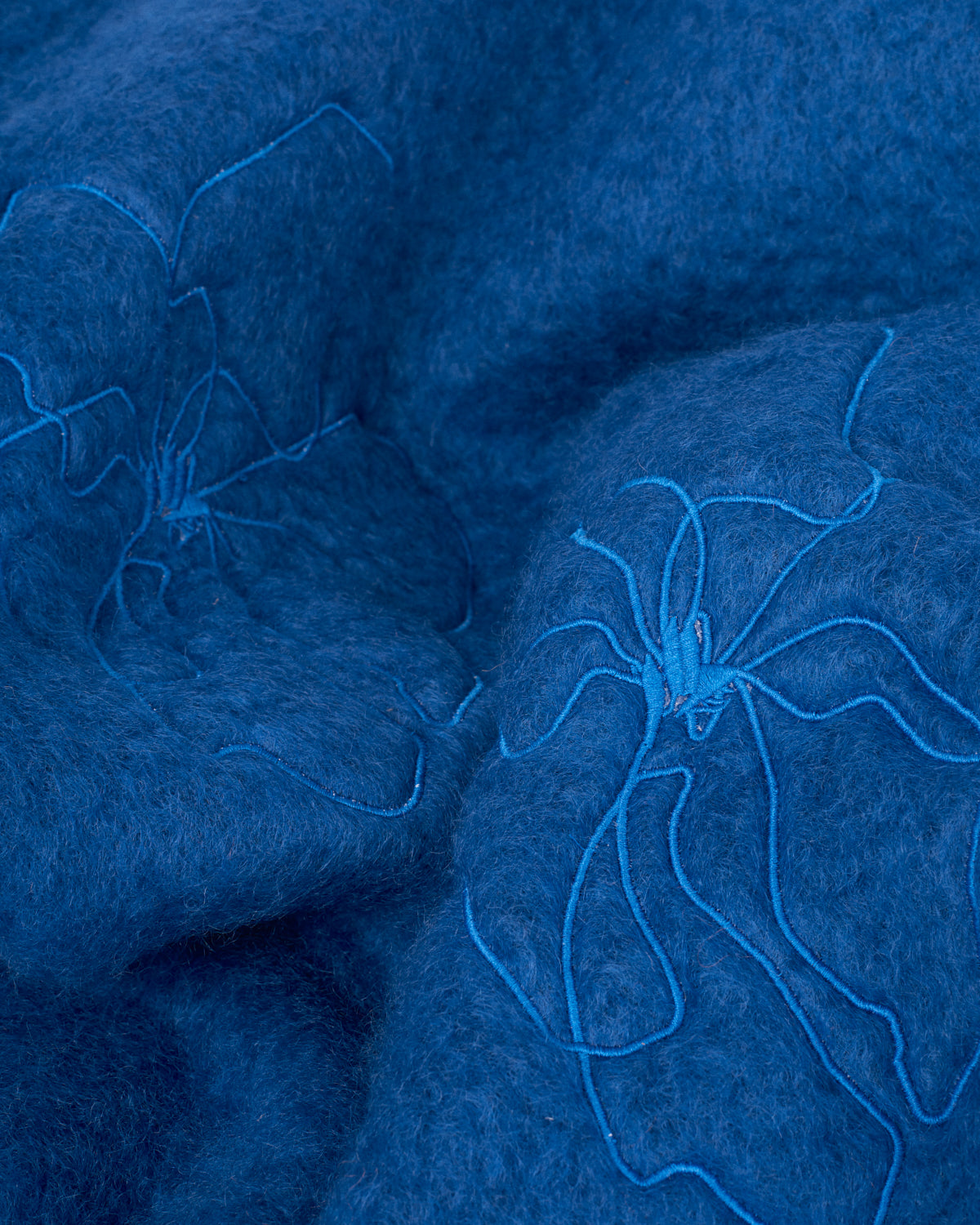 Blue mohair blanket with lilium embroidery