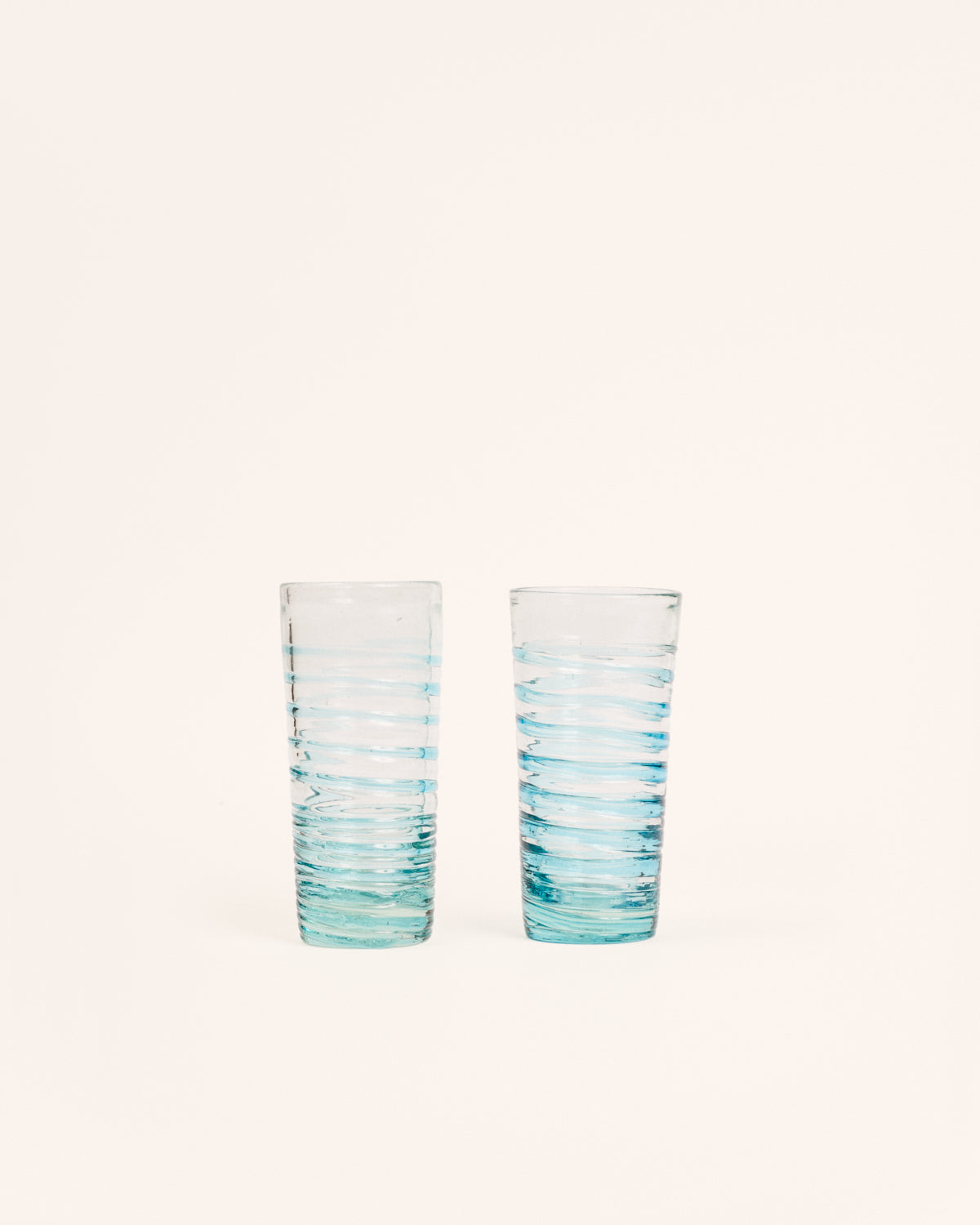 Pair of tall turquoise circle glasses