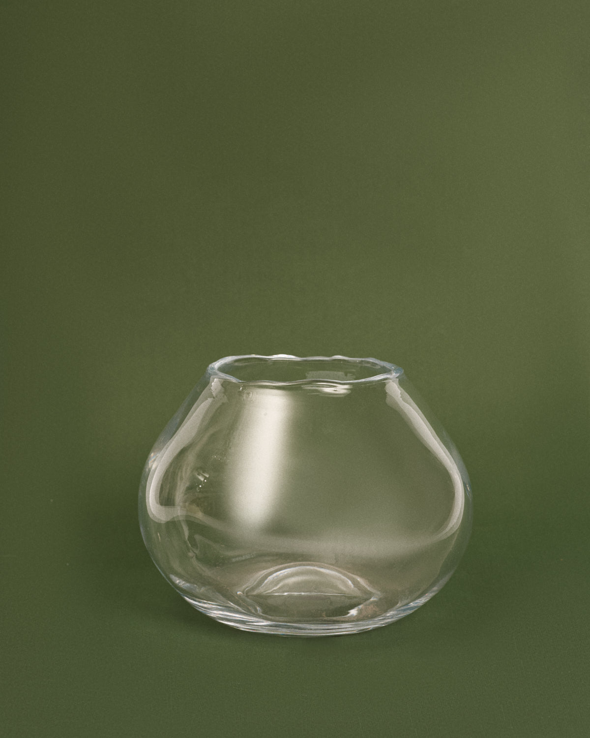 Uneven shaped glass vase