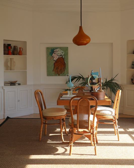 <transcy>Set of four vintage rattan and linen chairs</transcy>